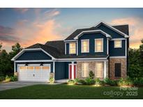Two-story home with a charming exterior, featuring stone and blue siding at 213 English Arbor Dr # 10, Fort Mill, SC 29715
