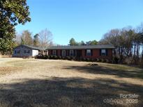 Brick ranch house with attached garage and large yard at 5590 S Nc 16 Business Hwy, Maiden, NC 28650