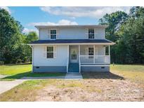 Two-story light blue house with white trim and porch at 4335 Saluda Rd, Rock Hill, SC 29730