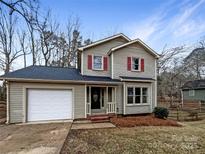 Two-story house with attached garage and landscaping at 209 Vermont Dr, Stanley, NC 28164