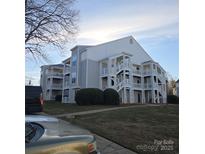 Gray two-story apartment building with white accents and balconies at 14 Hamiltons Bay Ct # 528, Lake Wylie, SC 29710