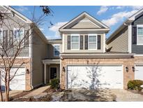 Attractive two-story townhome with a two-car garage and landscaping at 1206 Croft Dr # 98, Fort Mill, SC 29708