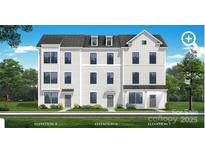 Three-story townhome boasting a charming farmhouse exterior with gray siding and a dark roof at 14016 Felix Ln # 6, Charlotte, NC 28277