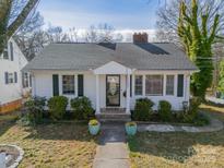 Charming white house with a classic design, landscaped yard, and walkway at 531 Elm St, Salisbury, NC 28144