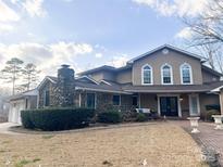 Two-story house with stone accents and a double front door at 660 Brandy Ct, Waxhaw, NC 28173