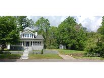 Charming home with a well-maintained front yard, traditional architecture, and inviting entrance at 105 N Inman Ave, Bessemer City, NC 28016