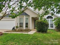 Charming one-story home featuring a bay window, well-maintained lawn, and a two-car garage at 3507 Southern Ginger Dr, Indian Trail, NC 28079