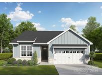 One-story home with gray siding, stone accents, and a two-car garage at 2087 Bonds Ln, Fort Mill, SC 29715