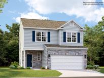 Two-story house with blue siding, stone accents, and a two-car garage at 5725 Olive Beach Rd, Kannapolis, NC 28081