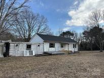 Ranch-style home with a large yard needing renovation at 3610 30Th Avenue Ne Pl, Hickory, NC 28601
