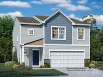 Two-story house with gray and blue siding, a two-car garage, and a dark blue front door at 2733 Legacy Ridge Ln, Catawba, NC 28609