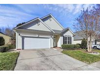 Craftsman style home with attached garage and landscaped lawn at 3229 Sapphire Ln, Fort Mill, SC 29708