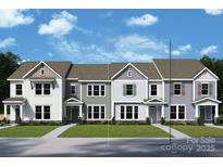 Three-unit townhome building; two-story; varying siding colors at 10115 Mamillion Dr, Huntersville, NC 28078