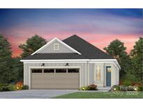 Craftsman style home with a two-car garage and landscaping at 1616 Shoals Ave # 152, Belmont, NC 28012