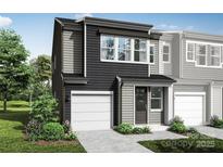 Modern two-story home with attached garage and landscaping at 2005 Endeavor Run, Charlotte, NC 28269