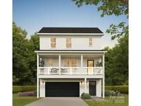 Charming two-story home with a welcoming front porch and a two-car garage at 2020 Sadler Woods Ln, Charlotte, NC 28214