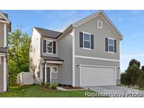 Charming two-story home featuring gray siding, black shutters, and an attached two-car garage at 110 Shay Crossing Rd # 1P, Salisbury, NC 28144
