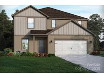 Two-story home with a two-car garage, manicured lawn, and inviting curb appeal at 134 Aberdeen Dr, Salisbury, NC 28144
