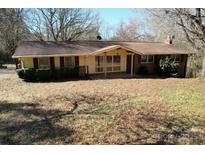 Charming single-story home with brick and vinyl siding and a covered front porch at 4730 16Th Street Ne Dr, Hickory, NC 28602
