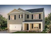 Charming two-story home with white garage and covered front porch at 7925 Old Brook Rd, Sherrills Ford, NC 28673