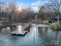 Picturesque waterfront property with a private dock and serene lake views at 5580 Crepe Myrtle Rd, York, SC 29745