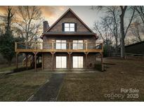 A charming two-story brick home with a spacious deck and well-maintained lawn at 5580 Crepe Myrtle Rd, York, SC 29745