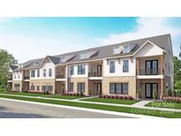 Charming multi-Gathering townhome with a brick facade, black window frames, and manicured landscaping at 3108 Endhaven Terraces Ln # 7, Charlotte, NC 28277