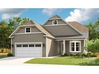 Charming single-Gathering home showcases a two-car garage and well-manicured lawn at 1039 Rabbit Hill Ln, Monroe, NC 28110