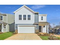 Charming two-story home featuring a spacious two-car garage and neutral-colored siding at 5336 Small St, Catawba, NC 28609