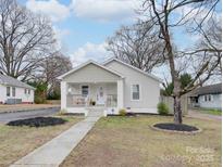 Charming single-story home with covered front porch, landscaped yard and modern curb appeal at 502 Marie Ave, Kannapolis, NC 28083