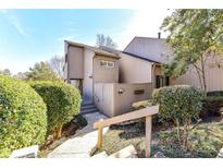 Charming townhome exterior featuring a private entry with natural landscaping at 84 Ridgeport Rd # B, Clover, SC 29710