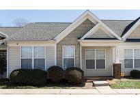 Charming townhome featuring classic architecture, manicured shrubs, and well-maintained landscaping at 1517 Tiana Way, Rock Hill, SC 29732