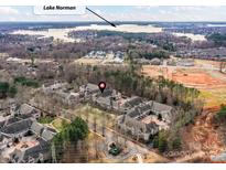 A beautiful neighborhood from above with the stunning Lake Norman in the background at 8925 Rosalyn Glen Rd, Cornelius, NC 28031