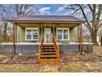 Charming home featuring a covered front porch and inviting curb appeal at 1759 Smith Ave, Gastonia, NC 28052