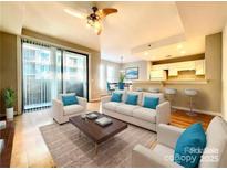 Bright living room with modern furnishings and open concept design at 718 W Trade St # 302, Charlotte, NC 28202