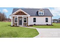 Charming single-story home features a welcoming front porch, neatly landscaped yard, and a gray-shingled roof at 2867 W Zion Church Rd, Shelby, NC 28150