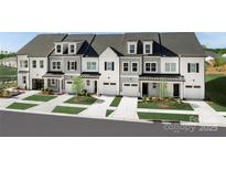 Charming townhome exteriors with well-manicured lawns, driveways and black accent roofing at 3020 Finchborough Ct # 230, Charlotte, NC 28269