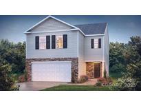 New two-story home boasts stone accents, white siding, black shutters, and a two-car garage at 3708 13Th Ne St, Hickory, NC 28601