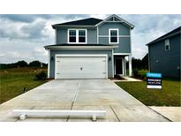 Charming two-story home featuring a spacious two-car garage and inviting curb appeal at 5208 Georgette Trl, Cherryville, NC 28021