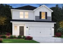Charming two-story home with a two car garage, white siding and a well-manicured lawn at 5202 Georgette Trl, Cherryville, NC 28021
