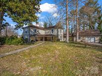 Inviting two-story home with a charming covered porch and a spacious front yard at 528 Sherrill Ave, Lincolnton, NC 28092