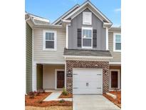 Charming townhouse with a brick facade and attached one car garage at 3562 Nimbell Rd, Monroe, NC 28110