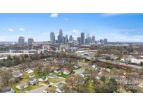 Amazing aerial view of the Charlotte skyline featuring the city's architectural landscape and surrounding neighborhood at 1007 Johnson St # 2, Charlotte, NC 28206