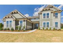 Beautiful new construction home with stone accents and craftsman-style details at 1010 Rolling Meadows Dr # Rm14, Mooresville, NC 28115
