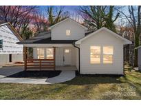 Charming, newly constructed two-story home with a covered front porch and landscaped yard at 38 Magnolia St, York, SC 29745