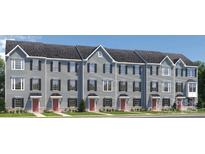 New gray townhomes showcase black shutters and red doors at 2159 Primm Farms Dr # C, Charlotte, NC 28216