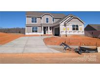 New two-story home featuring a gray exterior, an attached garage, and a concrete driveway at 2075 Fordhill St, Rock Hill, SC 29732