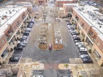 Overhead view of a well-maintained building with ample parking and convenient access for residents and visitors at 3920 Sharon Rd # 208, Charlotte, NC 28211