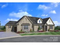 Charming single-story brick home with a well-manicured lawn and inviting curb appeal at 2069 Landry Ln # 233, Rock Hill, SC 29732