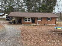 Charming single-story brick home with a cozy front yard at 22 Heritage View Rd, Hickory, NC 28601